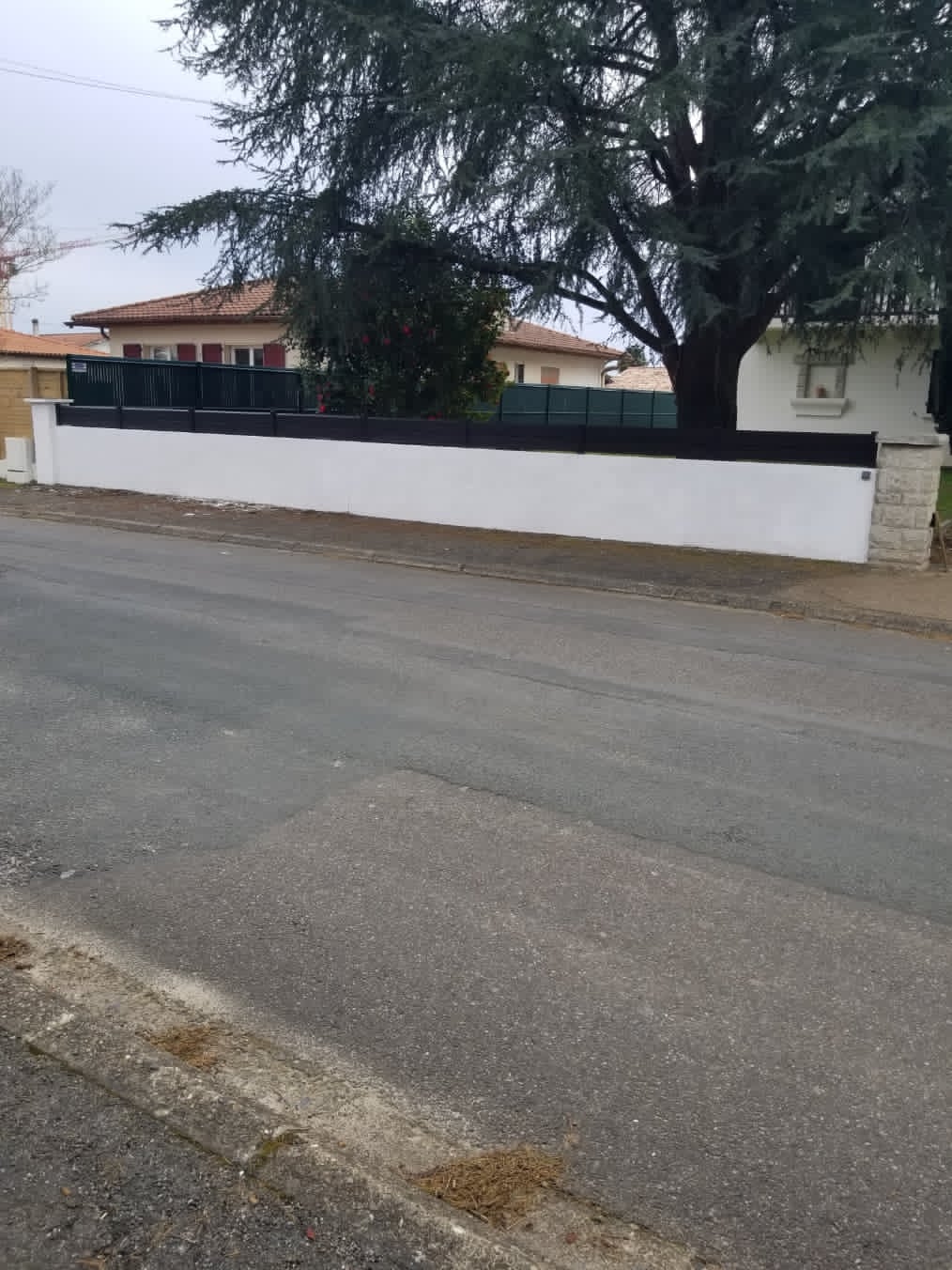 Clôture après travaux de peinture